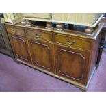 A Yew Effect Sideboard, top with moulded edge over three short drawers, cupboard doors on bracket