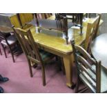 Early XX Century Oak Wind-Out Dining Table, with a moulded edge, tapering legs, extra leaf. Together