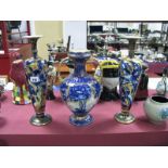 A Pair of Late Victorian Pottery Vases, of ovoid form decorated with blue transfer foliage and