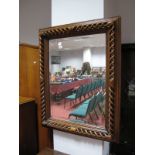 A Mid XX Century Mahogany Framed Rectangular Bevelled Wall Mirror, having pierced barley twist