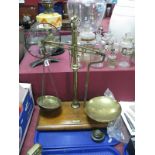 A Day and Millward Set of Brass Balance Scales, a mahogany plinth, with four weights, from 1oz to