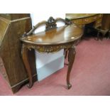 A Mahogany Demi Lune Table, with an applied low back with scroll decoration, the top with a