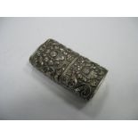 A Continental Cigarette Lighter, allover leaf scroll decorated in relief, with pull off cover, 6.