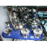 Oneida Four Piece Plated Teaset, initialled "B"; together with a cavalier plated four piece teaset:-