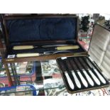 A Wooden Cased Three Piece Carving Set, with silver ferrules for "Thomas Turner & Co". Plus a