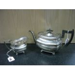 A Walker & Hall Matching Silver Teapot and Milk Jug, hallmarked Sheffield 1945, both of bulbous form