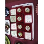 Six Halcyon Days Enamelled Christmas Boxes, 1980-85, each with certificate and box. (6)