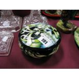 A Moorcroft Pottery Circular Lidded Box, decorated with the Green Glade design by Nicola Slaney,