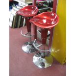 A Pair of Extendable Modern Kitchen Chairs, in metallic red with chrome foot rests and circular