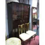 A 1920's Mahogany Double Wardrobe, having twin panelled doors on plinth base. Together with a