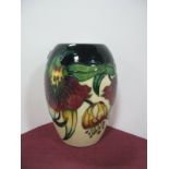 A Moorcroft Pottery Vase, decorated with the Anna Lily design by Nicola Slaney, shape 102/5,