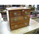 A Late Victorian Pitch Pine Chest of Drawers, of small proportions, fitted with two short and two