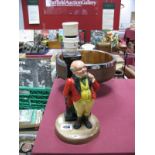 A Bretby "Mr Pickwick" Pottery Table Lamp Base, on circular foot, height 21.5cms, with shade.