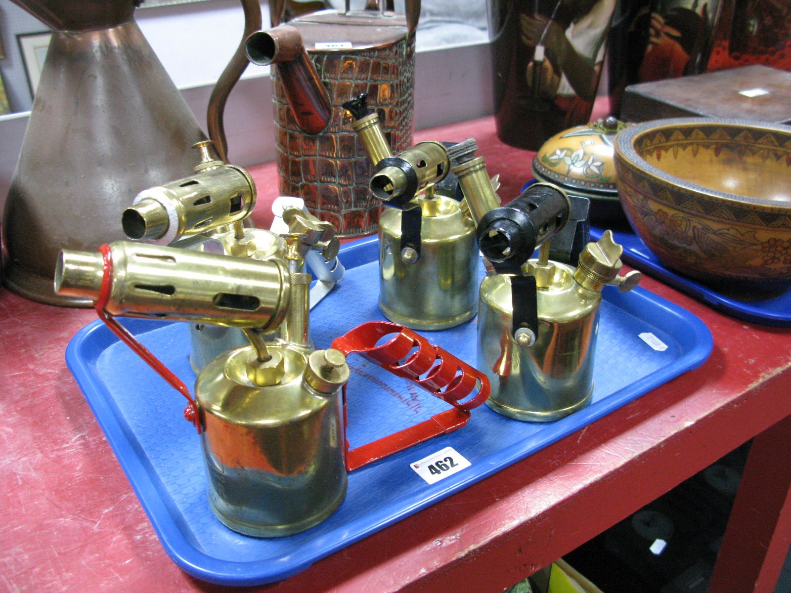 Four Half Pint Brass Parafin Blow Lamps, varying makers including Monitor and Govenor:- One Tray