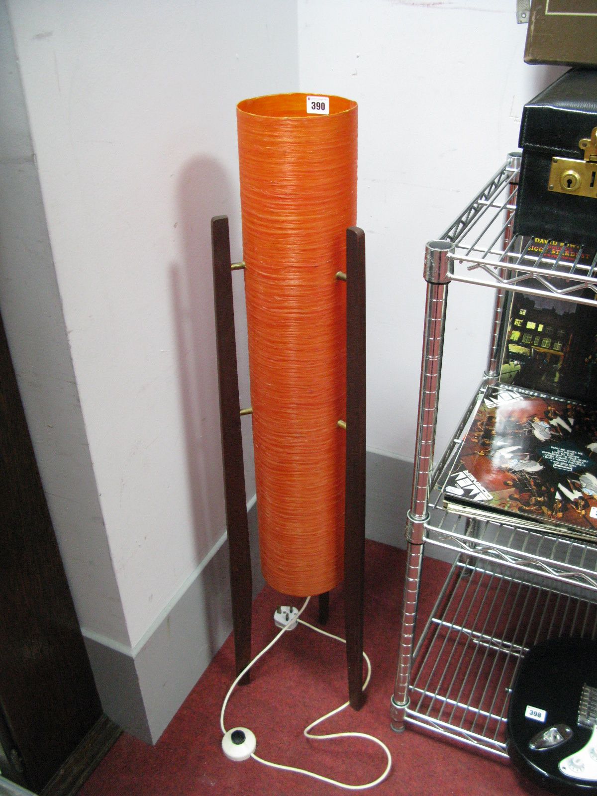 A Circa 1960's "Rocket" Floorstanding Lamp, with orange cylindrical shade.