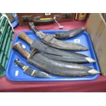 Five Kukri Knives, varying designs, sizes and at different levels of completeness, carved hardwood