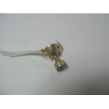 9ct Gold Bracelet Charm, in the form of a two handled trophy, engraved "1966" to one side,