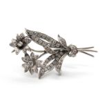 A Diamond Set Flower Spray Brooch, set throughout with graduated brilliant cut stones.