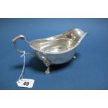 A Hallmarked Silver Sauce Boat, Frank Cobb, Sheffield 1963, with gadrooned edge and leaf capped