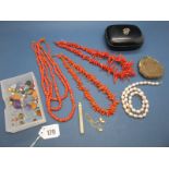 A Three Row Coral Bead Necklace, together with two twig coral necklaces, assorted unmounted