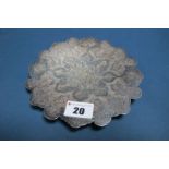 A Middle Eastern Shallow Dish, of shaped circular design, with foliate detail and scroll decoration,