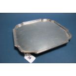 A Hallmarked Silver Salver, Hawksworth, Eyre & Co Ltd, London 1919, of shaped square form, raised on