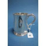 A George II Hallmarked Silver Tankard, RB, London 1735, of plain baluster form, with scroll