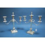 A Pair of Fattorini & Sons Electroplated Twin Branch Candlesticks, each with reeded scroll arms,