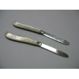 Two Hallmarked Silver Bladed Folding Fruit Knives, each with decorative scales. (2)