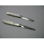 Two Hallmarked Silver Bladed Folding Fruit Knives, each with decorative, shaped mother of pearl
