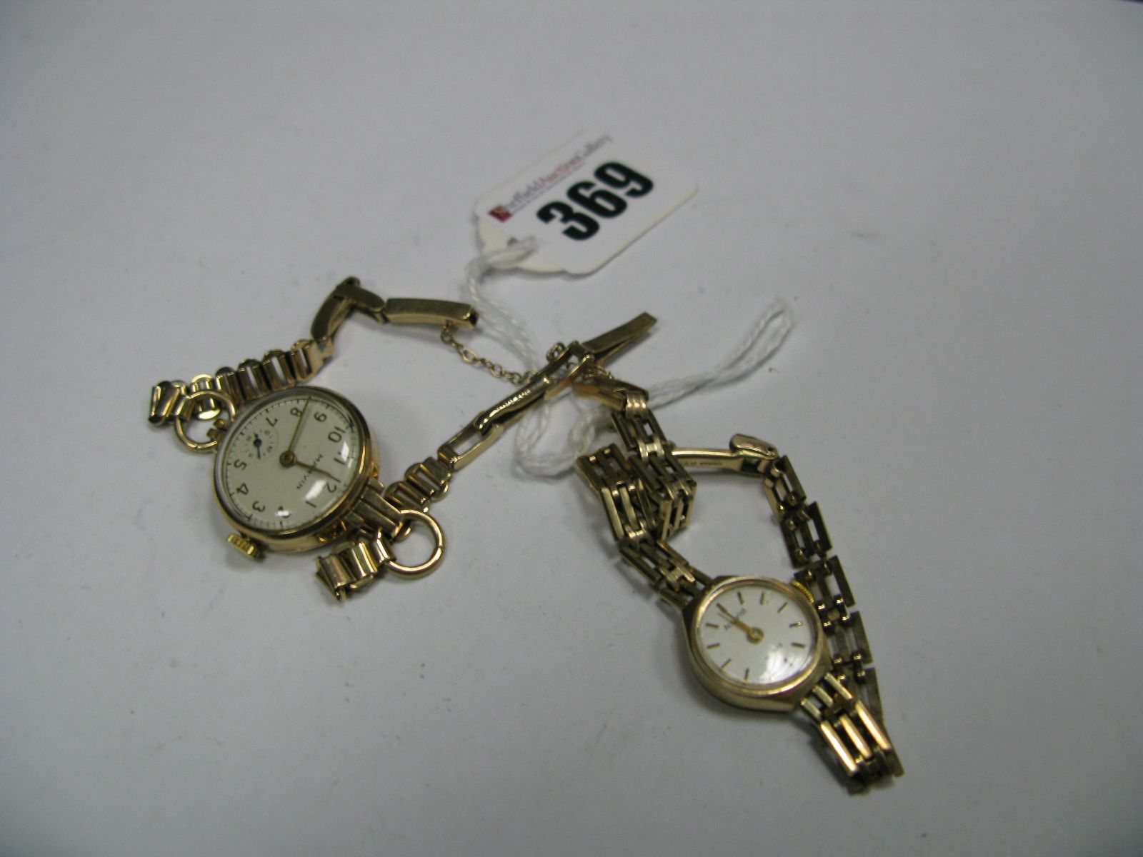 Accurist Lady's Wristwatch, stamped "0.375", together with another lady's wristwatch. (2)