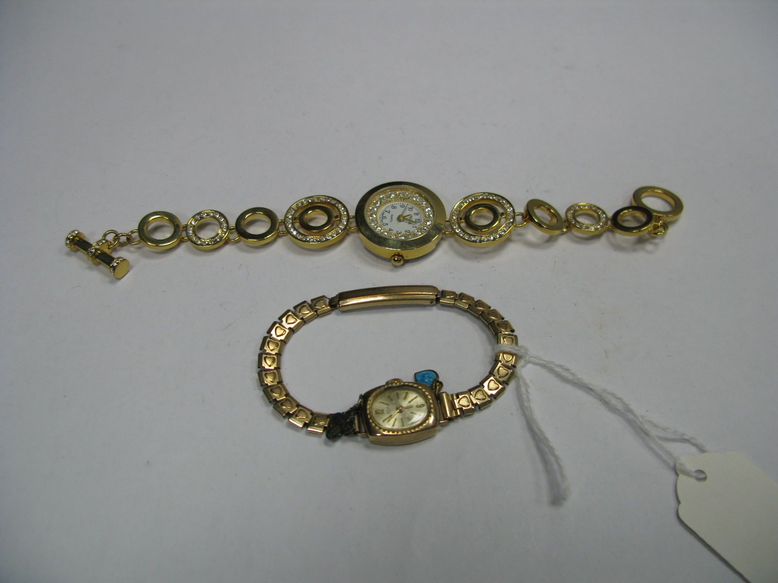 A 9ct Gold Cased Lady's Wristwatch, on later bracelet; together with a modern lady's wristwatch,