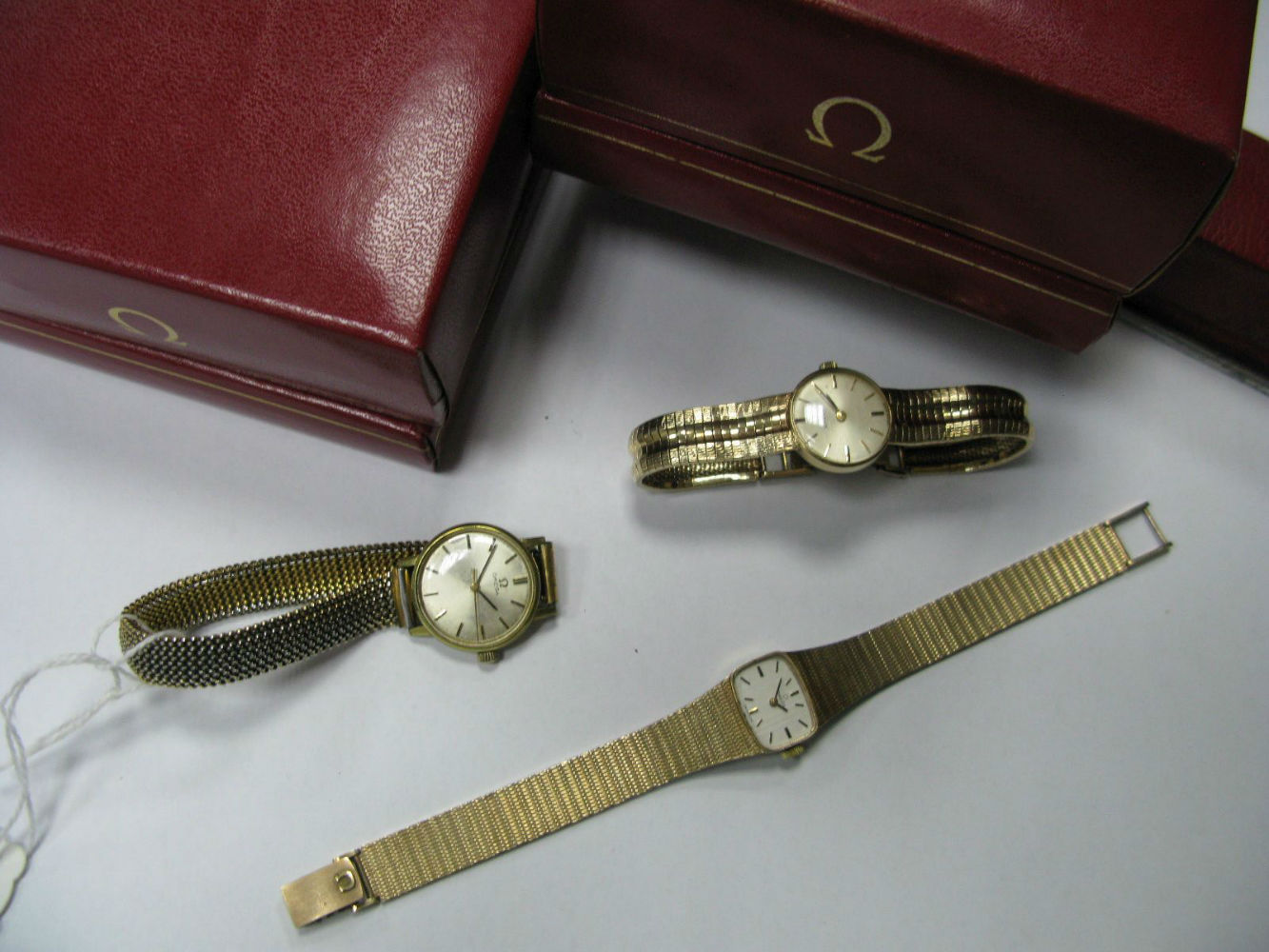 Omega; A Lady's 9ct Gold Cased Wristwatch, the signed cushion dial with baton markers, within