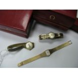 Omega; A Lady's 9ct Gold Cased Wristwatch, the signed cushion dial with baton markers, within
