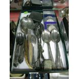 Plated Cutlery, assorted commemorative coins and a vest case, detailed with an angler.