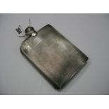 A Hallmarked Silver Hip Flask, of rectangular form, allover engine turned.