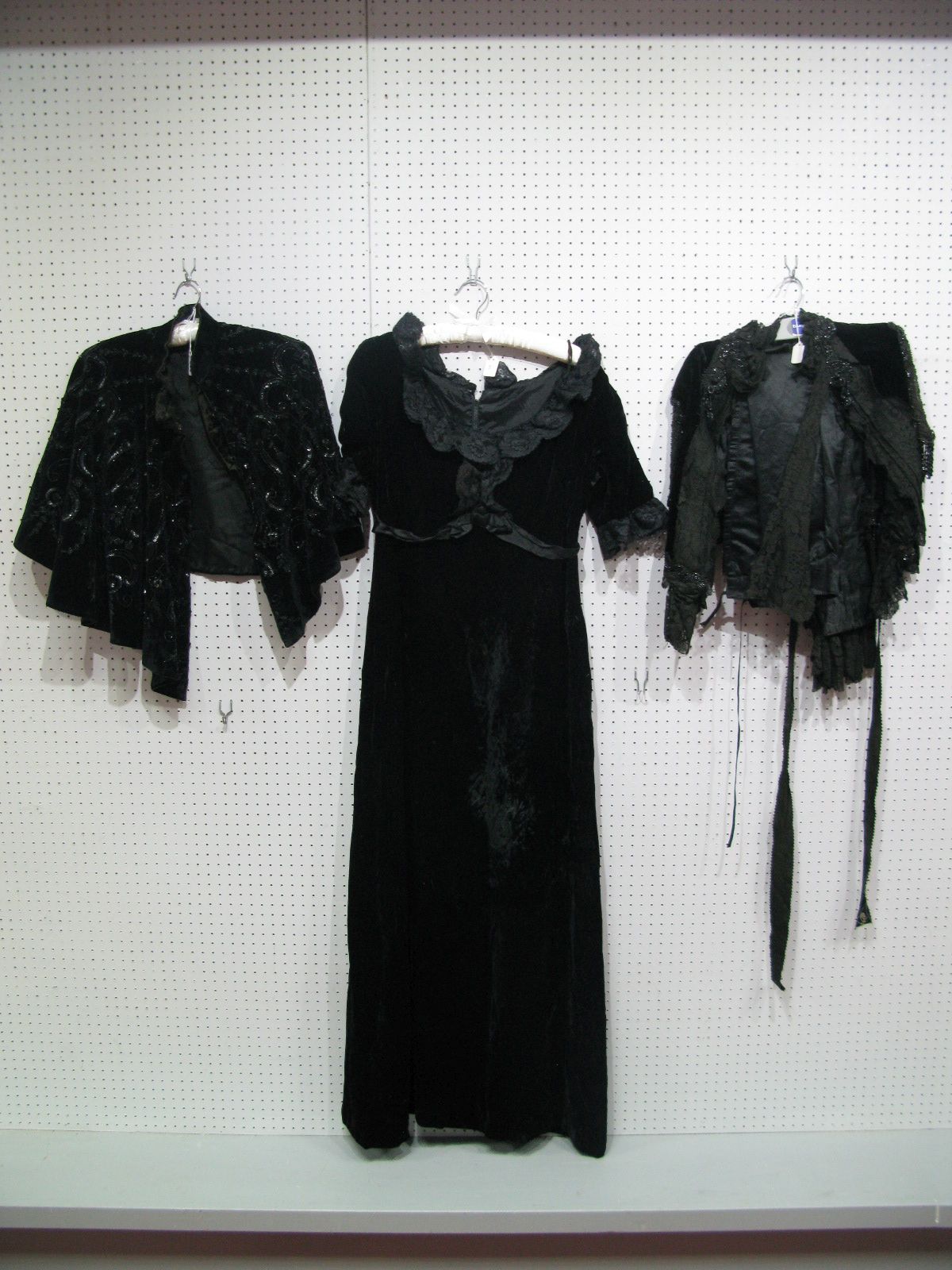 A Victorian Black Velvet Capelet, heavily embellished with jet beads and sequins; A Victorian