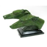 M. BERTIN A Circa 1925 Patinated Metal Study of Two Greyhounds, cast side by side, with a green