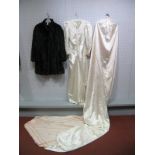 A Mid XX Century Off-White Figured Pure Silk Wedding Dress, fitted and gathered to the centre seam