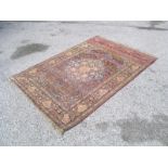 A Mid XX Century Persian Wool Rug, possibly Bakhtiari, the central blue shaped medallion floral-