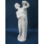 A Late XIX Century Marble Figure, after the antique, depicting a semi-naked young woman disrobing,