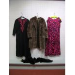 A Mid Brown Fur Coat, 95cms long; a c.1970's Frederick Howard of London black crepe evening dress,