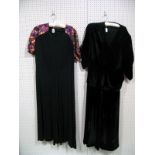 A c.1940's Tea Dress, in black crepe with sweetheart neckline and contrasting floral fabric sleeves,