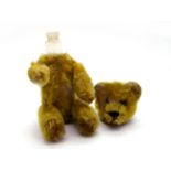 An Early XX Century Schuco Teddy Bear Perfume Flask, with yellow fur, stitched nose, black button