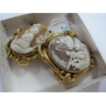 Two XIX Century Oval Shell Craved Cameo Brooches, each within elaborate mount. (2)