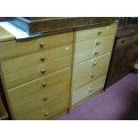 A Pair of Easifit Teak Six Height Chests, of graduating drawers.