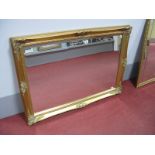 A Modern Rectangular Bevelled Wall Mirror, in scrolled gilt frame, 60 x 90cms.