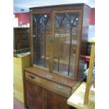 A Reproduction Mahogany Display Cabinet, glazed upper section with lancet arch detailing over single