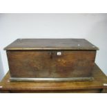 A XIX Century Elm Blanket Box, with hinged lid, candle box, on a plinth base.