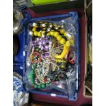 A Mixed Lot of Assorted Costume Jewellery, including beads, bangles, etc:- One Box